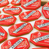 Hexagonal cookies with Claridge's London branding on a white background